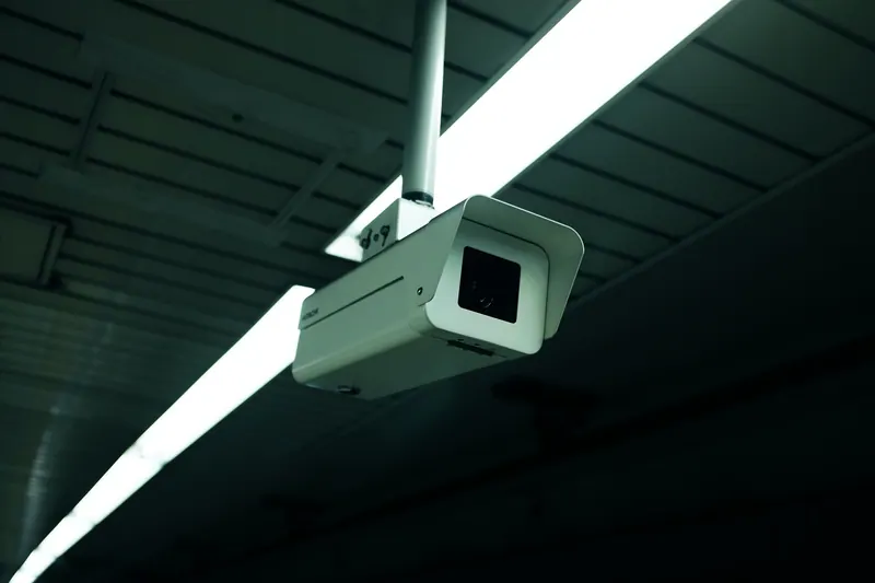 Ceiling-mounted security camera in an indoor venue