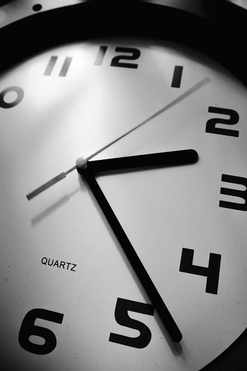 Detailed black and white photo of a quartz clock face