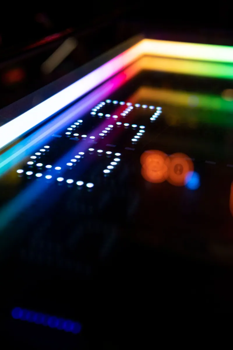 Vibrant arcade machine display with colorful illuminated numbers
